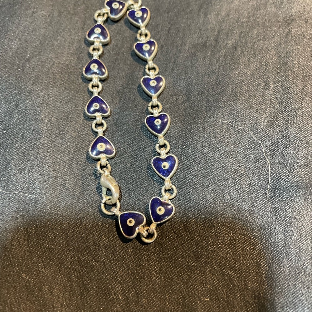 Beautiful bracelet made with nickel and blue stone hearts